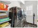 Functional laundry room with modern washer and dryer, and ample storage space at 1665 Millhouse Lndg, Marietta, GA 30066