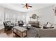 Inviting living room filled with natural light, hardwood flooring, and comfortable seating at 1665 Millhouse Lndg, Marietta, GA 30066