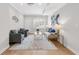 Living room featuring seating, rug, lighting, and window at 1665 Millhouse Lndg, Marietta, GA 30066