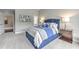 Comfortable bedroom featuring carpet, a ceiling fan and a view to the hall at 1956 Grace Arbor Ne Ct, Atlanta, GA 30329