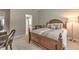 Bedroom with carpet, a large window, neutral walls, ceiling fan and a chair at 1956 Grace Arbor Ne Ct, Atlanta, GA 30329