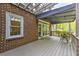 This home features a delightful deck, perfect for outdoor relaxation and entertaining with a retractable awning at 1956 Grace Arbor Ne Ct, Atlanta, GA 30329