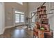 Stately foyer with hardwood floors, double doors, and a custom decorative shelving at 1956 Grace Arbor Ne Ct, Atlanta, GA 30329