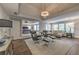 This spacious living room features dark hardwood floors, recessed lighting, and access to the bedroom at 1956 Grace Arbor Ne Ct, Atlanta, GA 30329