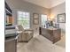 Office features a large desk, neutral walls, natural lighting, and space for multiple purposes at 1956 Grace Arbor Ne Ct, Atlanta, GA 30329