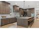 Gorgeous kitchen with a large island, seating, custom cabinets, and modern appliances at 402 Chattahoochee St, Roswell, GA 30075
