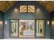 Covered patio leads to great room at 402 Chattahoochee St, Roswell, GA 30075