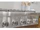 Close-up of stainless steel kitchen range and knobs at 402 Chattahoochee St, Roswell, GA 30075