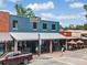 Street view showcases a popular restaurant with outdoor seating and stylish architecture in a lively downtown area at 402 Chattahoochee St, Roswell, GA 30075