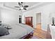 Comfortable primary bedroom featuring hardwood floors and neutral colored walls at 510 Riverview Ln, Canton, GA 30114