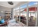 This sunroom features lots of natural light and a view of the backyard patio at 510 Riverview Ln, Canton, GA 30114