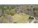 Aerial shot of lot with a house and outbuilding at 3341 Camelot Way, Loganville, GA 30052