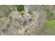 Overhead aerial view of the house and wooded grounds at 3341 Camelot Way, Loganville, GA 30052