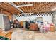 Unfinished basement provides tons of storage space, and the ceiling is exposed at 3341 Camelot Way, Loganville, GA 30052