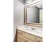 Well-lit bathroom with modern sink and a large mirror at 3341 Camelot Way, Loganville, GA 30052
