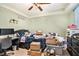 Bedroom filled with items, featuring a comfortable bed and functional workspace at 3341 Camelot Way, Loganville, GA 30052