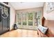 A well-lit foyer with views of the outdoors from large windows at 3341 Camelot Way, Loganville, GA 30052