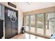 Foyer featuring ample natural light from large windows and a decorative front door at 3341 Camelot Way, Loganville, GA 30052