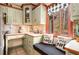 Kitchen featuring built-in bench seating and a desk area with decorative accents at 3341 Camelot Way, Loganville, GA 30052