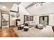 Bright living room with a cozy seating area and an open doorway to another room at 3341 Camelot Way, Loganville, GA 30052