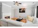 Inviting living room features hardwood floors, fireplace, and neutral color palette at 3956 Church View Ln, Suwanee, GA 30024