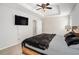 Large main bedroom boasts a tray ceiling, soft carpet, and ample natural light at 3956 Church View Ln, Suwanee, GA 30024