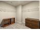 Walk-in closet with carpet, shelving, and space for organizing clothes and accessories at 11973 Lovejoy Crossing Way, Hampton, GA 30228