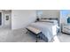 Comfortable bedroom includes an upholstered bed frame and matching dressers at 3726 Willingham Sw Run, Marietta, GA 30008