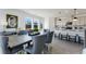 Open-concept dining room connected to a kitchen, and providing an ideal space for gatherings at 3726 Willingham Sw Run, Marietta, GA 30008