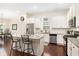 Modern kitchen with stainless steel appliances and granite countertops at 3804 Hawk Tail Dr, Loganville, GA 30052