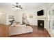 Open living room featuring a fireplace and access to the patio at 3804 Hawk Tail Dr, Loganville, GA 30052