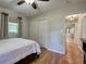 Bedroom featuring hardwood floors, a ceiling fan, a closet and view to a nearby hallway and room at 4361 Stanley Dr, Powder Springs, GA 30127