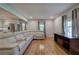 Bright living room with hardwood floors, large window, and comfortable seating at 4361 Stanley Dr, Powder Springs, GA 30127