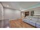 Spacious living area with hardwood floors, a fireplace, and an open view to the kitchen at 4361 Stanley Dr, Powder Springs, GA 30127