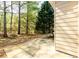 Back patio with wooded view and table and chairs at 742 Hope Hollow Ln, Loganville, GA 30052