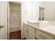 Bathroom featuring a modern vanity with light cabinets and a bright shower at 742 Hope Hollow Ln, Loganville, GA 30052