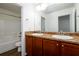 Bathroom with double sink vanity and granite countertop and shower at 742 Hope Hollow Ln, Loganville, GA 30052