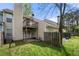 Private backyard boasts a deck, patio, fenced-in area, and lush greenery, providing a serene outdoor space at 5908 Trent Walk Dr, Lithonia, GA 30038