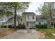 Welcoming home with neat landscaping, stone accents, and a cozy front porch, showcasing curb appeal at 5908 Trent Walk Dr, Lithonia, GA 30038