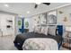 Comfortable bedroom with a ceiling fan, neutral walls, and a walk-in closet at 1155 Christian Se Cir, Conyers, GA 30013