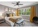 Spacious bedroom with natural light and a large window at 1155 Christian Se Cir, Conyers, GA 30013