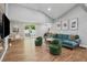 Inviting living room with fireplace, comfortable seating, and access to a dining area and the outdoors at 1155 Christian Se Cir, Conyers, GA 30013