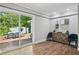 Bright sun room with sliding glass doors leading to the backyard patio and deck at 1155 Christian Se Cir, Conyers, GA 30013