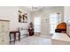 Bedroom with carpeted floor, an art painting, and two windows with white curtains at 2168 Rock Creek Park, Decatur, GA 30033