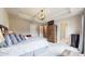 This bedroom features a tray ceiling, walk-in closet and ensuite, perfect for relaxation and convenience at 2168 Rock Creek Park, Decatur, GA 30033