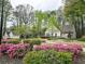 Beautifully landscaped community with clubhouse, swing, and walkways, perfect for recreation and community interaction at 2168 Rock Creek Park, Decatur, GA 30033