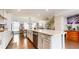 Bright kitchen with a large island, stainless steel appliances, and views of the dining area, perfect for modern living at 2168 Rock Creek Park, Decatur, GA 30033