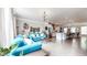 Bright living area showcasing hardwood floors, recessed lighting, and open layout to dining and kitchen at 2168 Rock Creek Park, Decatur, GA 30033