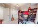 Office space with a desk, bookshelves, sports flag and guitar at 2168 Rock Creek Park, Decatur, GA 30033