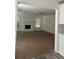 Inviting living room featuring a fireplace and large windows for natural light at 4264 Parks Ridge Dr, Snellville, GA 30039